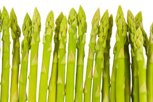 Fresh green asparagus isolated on a white background