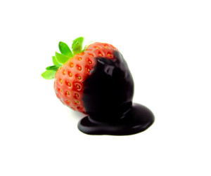 strawberry dipped in chocolate  over white background